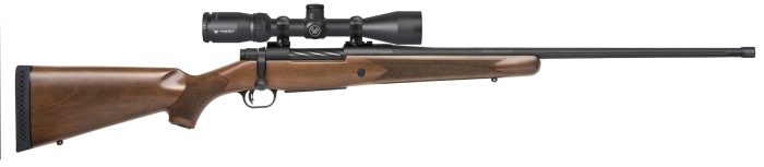 Bolt-action rifle with wooden stock and mounted scope