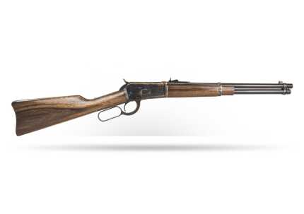 Vintage lever-action rifle isolated on white background