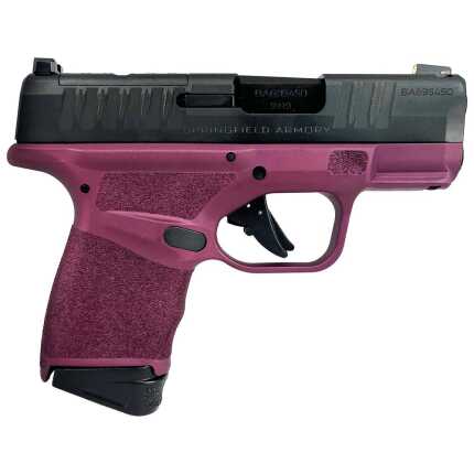 Pink Springfield Armory handgun isolated on white