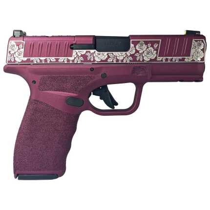 Pink handgun with floral design