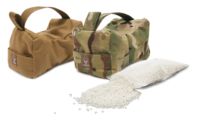 Sandbags with spilled white sand