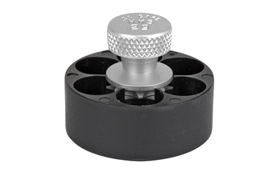 Black round mechanical device with textured knob