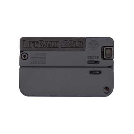 Compact LifeCard .22LR folding gun isolated on gray