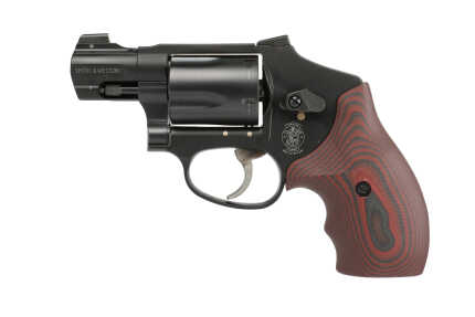 Smith & Wesson revolver with red grips on white.