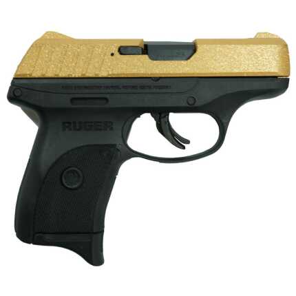 Ruger handgun with gold-colored slide and black grip