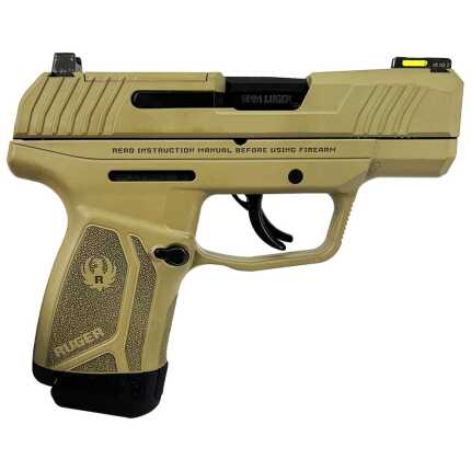 Tan colored compact handgun on white background