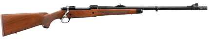 Wooden stock bolt action rifle with scope