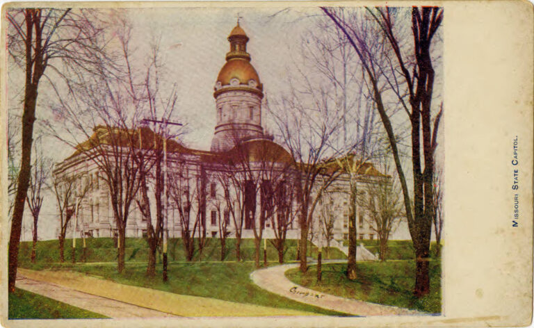 Missouri State Capitol building with a Second Amendment flag waving in the background