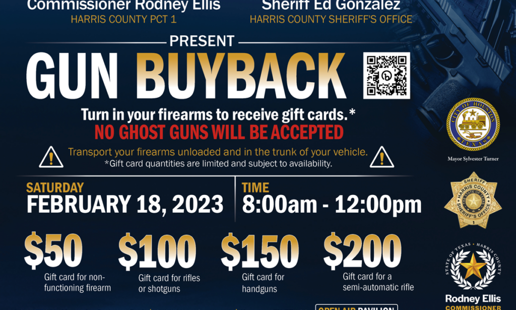 Sign advertising a gun buyback event with a police officer standing nearby