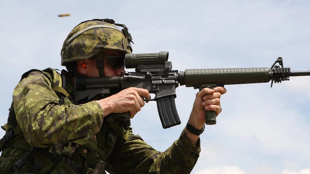 Canadian soldier holding a modernized AR-15 style rifle during a training exercise