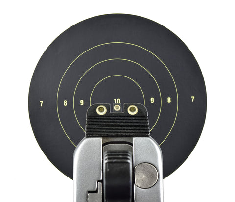 Close up of a handgun showing proper alignment of front and rear rear sights