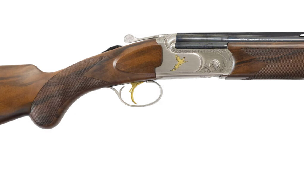 Breda Victoria over-under shotgun with Turkish walnut stock and engraved receiver on display