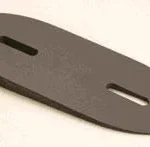 KICK-EEZ Pitch Spacer, angled top view of dark brown oval spacer with two slots