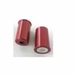 Carlson's Snap Caps, two red aluminum snap caps shown upright and on their side