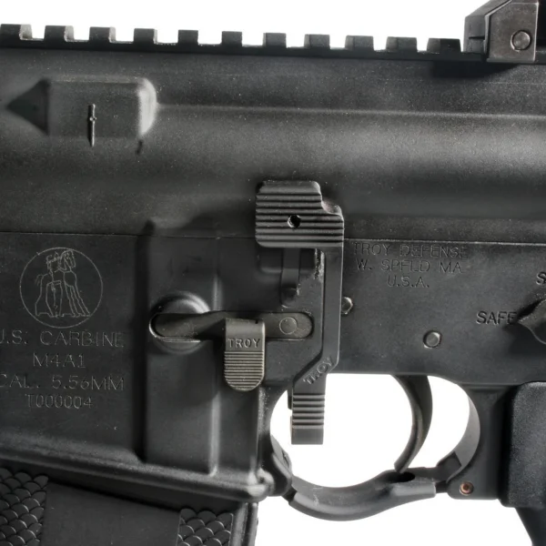 TROY AMBI BOLT RELEASE BLK, close-up of black release mounted on a black rifle receiver