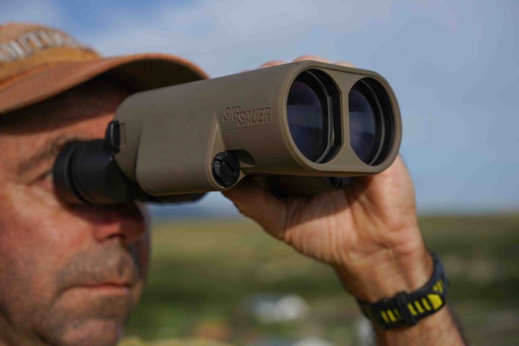 A high-quality optical riflescope mounted on a hunting rifle