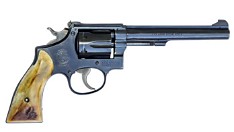 Vintage Smith & Wesson K-22 Masterpiece rimfire revolver with walnut grips