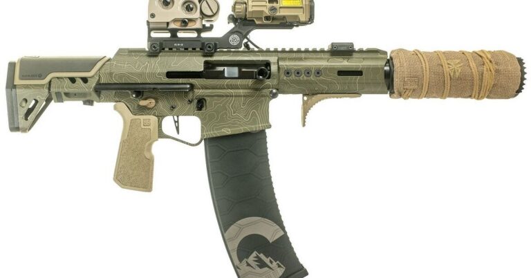 Genesis Arms Gen-12 PDS semi-automatic shotgun with suppressor attached