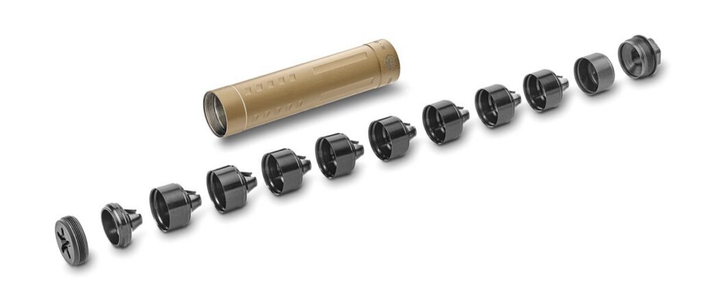 A modern handgun equipped with a high-quality suppressor at a range