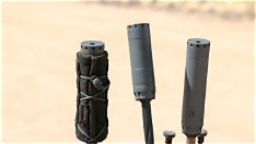 A modern titanium suppressor mounted on a precision-range rifle