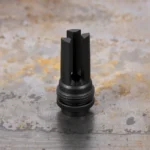 SilencerCo ASR Flash Hider black metal flash hider, upright view with prongs and threaded base