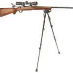 AOB Caldwell XLA pivot bipod, black extended front view supporting a wood-stock rifle