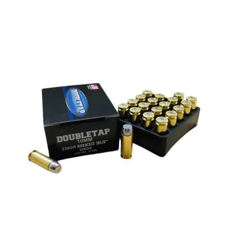 Double Tap Hardcast Solid Handgun Ammunition, brass cartridges in a tray beside black box