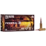 Federal FED FUSION 224VLK, front of ammunition box with two cartridges beside it