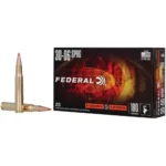 Federal Fusion Rifle Ammunition, black and red retail box beside three brass cartridges