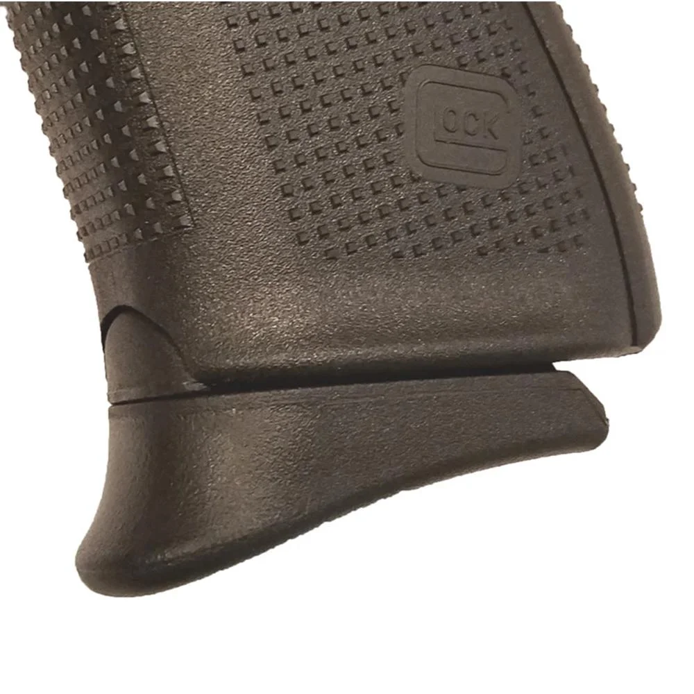 glock-gen-4-5-mid-full-size-grip-extension-primary-1 PEARCE GRIP EXT FOR GLK G4/5 M/FL SZ brown, close-up installed beneath a textured pistol grip