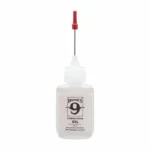 Hoppe's HOPPES #9 PRECISION LUBE 14.9ML white squeeze bottle with red needle applicator, front view