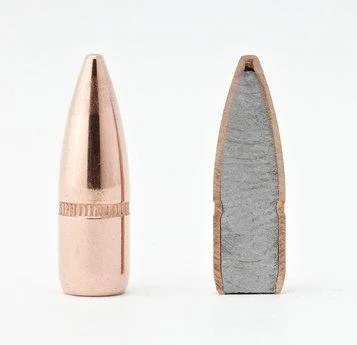 Hornady Traditional FMJ Rifle Bullets copper-coloured bullet and sectioned bullet, front view