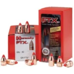 Hornady FTX Rifle Bullets, copper-coloured bullets with red tips displayed beside red boxes