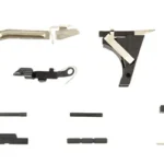 KCI USA Lower Parts Kit Fits Glock 17 with assorted black, silver and tan components