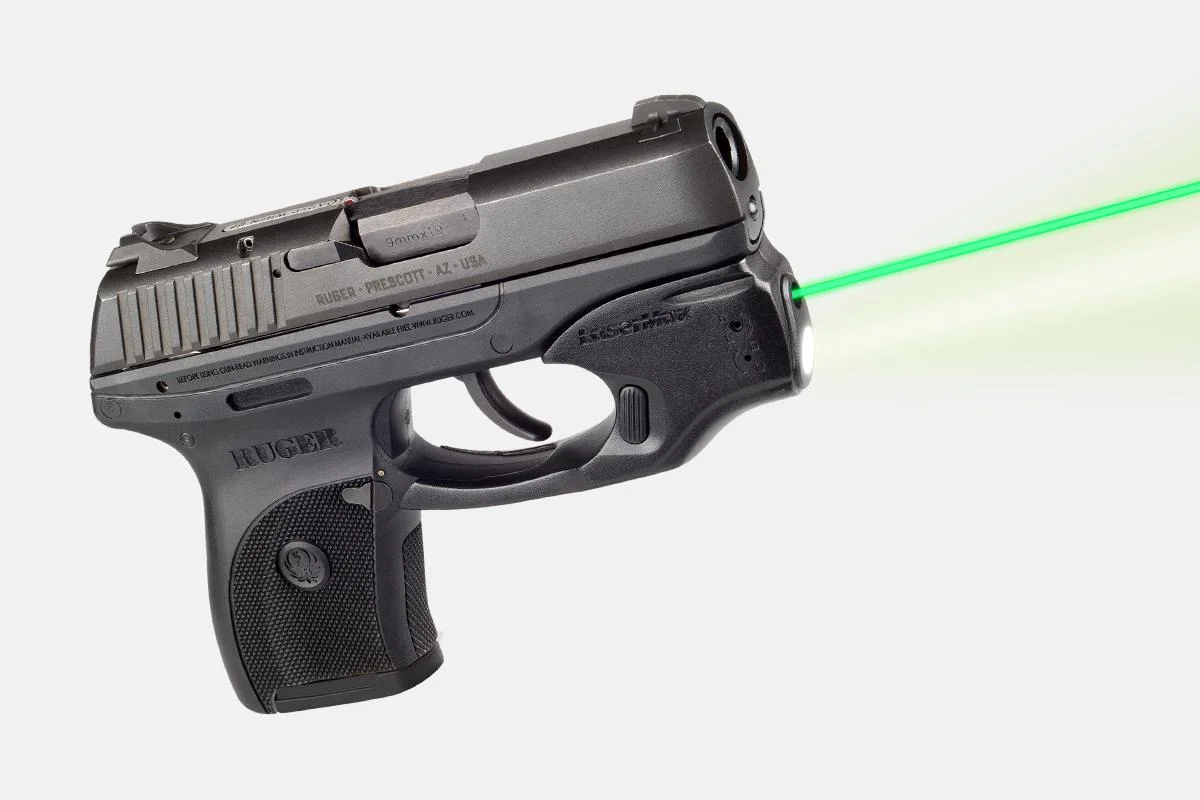 lasermax-green-ruger-gripsense-laser-primary LaserMax Green Ruger GripSense Laser for LC9 LC9S LC380 EC9S, mounted on black pistol with green beam