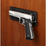 Hornady Magnetic Accessory Mount black rectangular mount holding a silver and black pistol