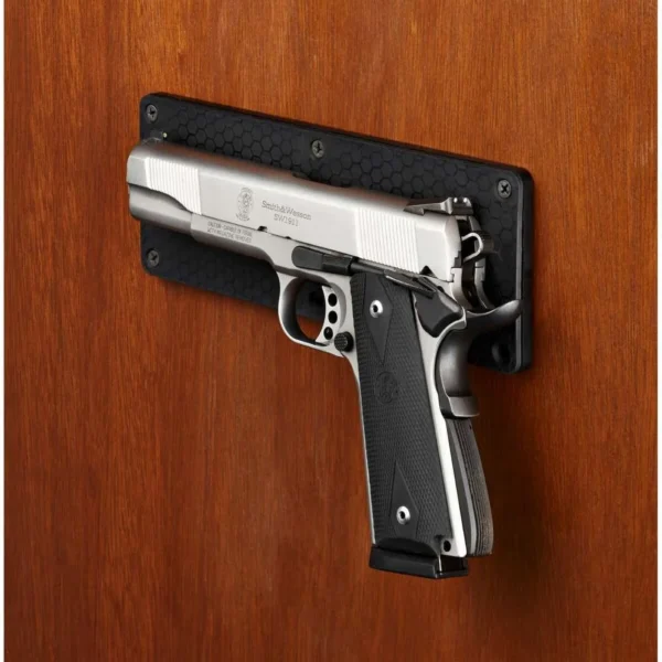 Hornady Magnetic Accessory Mount black rectangular mount holding a silver and black pistol