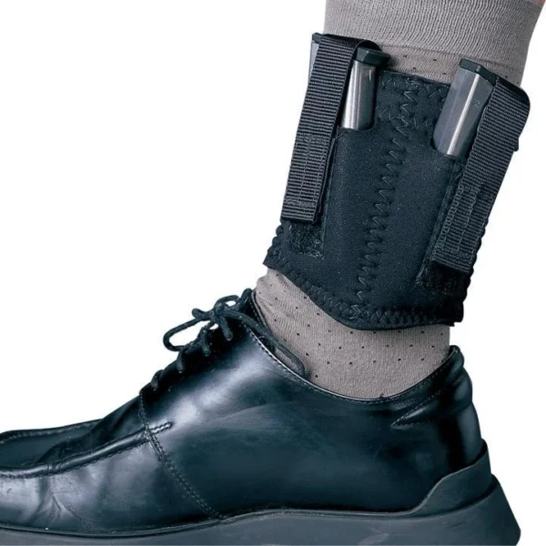 DeSantis Neoprene Ankle Double Magazine Holster, black holster worn above a black shoe
