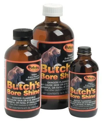 Pachmayr Butch's Bore Shine, three amber bottles with black and white caps and branded labels