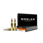 Nosler Ballistic Tip Varmint ammunition box with three brass cartridges, front view