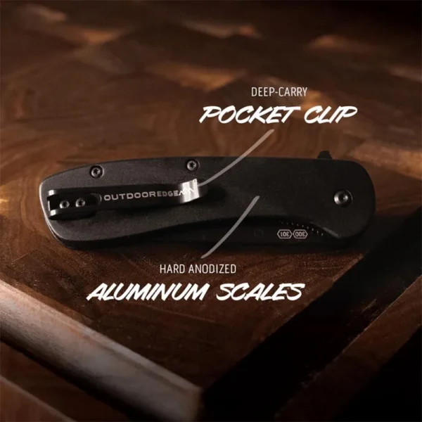 Outdoor Edge Razor VX1 black folding knife, closed top view with pocket clip and black handle