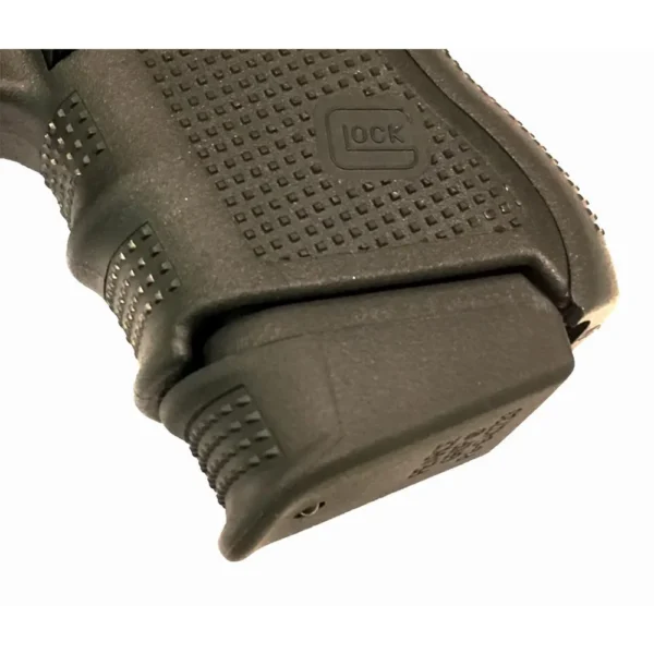 Pearce Grips Plus Grip Extension, black extension fitted to a pistol grip, close-up view