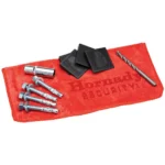 Hornady Premium Safe Anchoring Kit, silver bolts, drill bit and black pads on a red mat