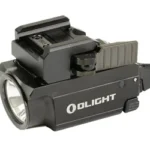 Olight Baldr Mini black weapon light in right-side view with mounting clamp and lens