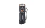 FENIX E18R V2 black, angled front view with round lens, side button and pocket clip