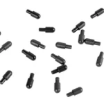 LBE AR15 BOLT CATCH PLUNGER 20PK black plungers scattered on a white background