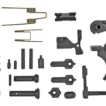 STRIKE AR ENHANCED LOWER PARTS KIT black and metal controls, pins and springs arranged in top view