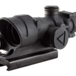 TRIJICON ACOG 4X32 LED black optic in front three-quarter view with mount and lens caps