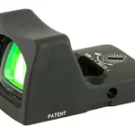 TRIJICON RMR TYPE 2 3.25 MOA BLK black reflex sight, front-left view with green-tinted lens