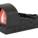 Shield Sights SHLDS SMSC GLASS ED MINI SIGHT 4MOA black angled front view with red-tinted lens